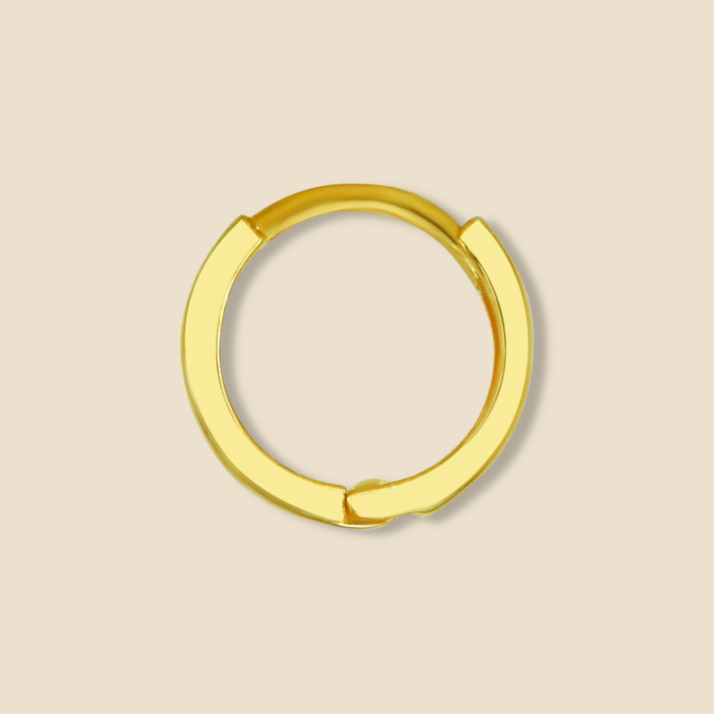 14K Gold Small Plain Huggie Earrings in yellow gold displayed on a plain background, highlighting their minimalist design, polished finish, and dainty 8 mm size.