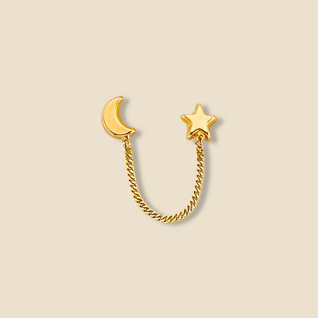 14K Gold Star & Moon Crawler Stud Earrings displayed on a plain background, highlighting their whimsical celestial design and polished yellow gold finish.