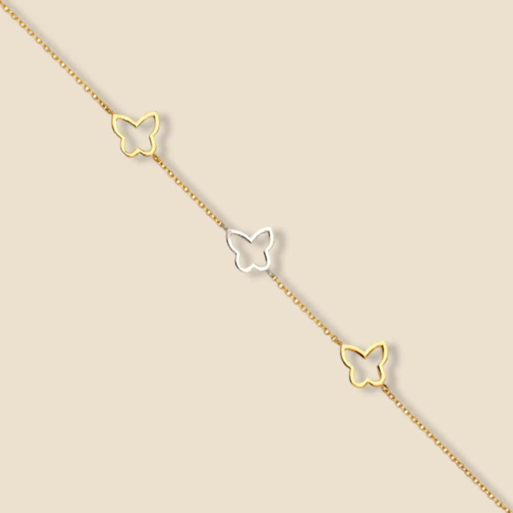 14K Solid Gold Butterfly Bracelet – A delicate and lightweight gold bracelet featuring an elegant butterfly design, measuring 7 + 1 inches and weighing approximately 1.7 grams, displayed on a plain background.